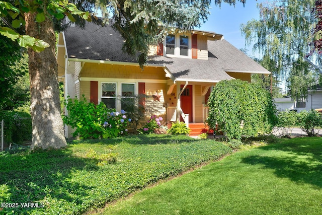 14 N 37th Ave, Yakima, WA 98902 - view of front of house with a front yard and a shingled roof