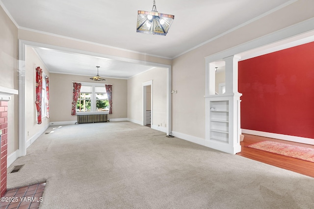 14 N 37th Ave, Yakima, WA 98902 - spare room with radiator heating unit, carpet flooring, and ornamental molding