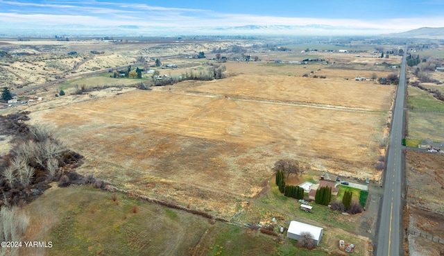 drone / aerial view with a rural view and a mountain view