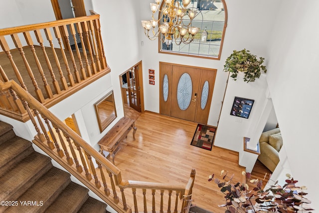 191 Alteejen Rd, Zillah, WA 98953 - entryway with a towering ceiling, wood finished floors, a notable chandelier, and stairway