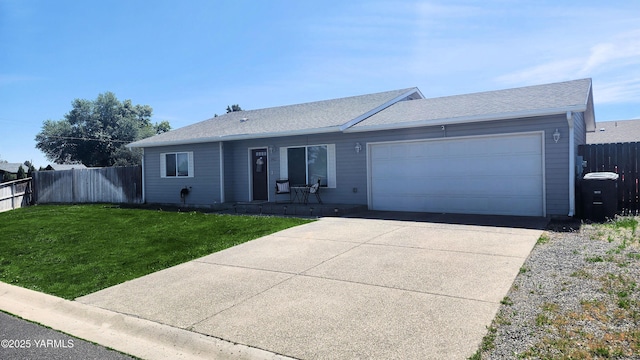 6402 Crestfields Rd, Yakima, WA 98908 - ranch-style home with a garage, concrete driveway, and roof with shingles