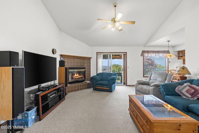 5304 Channel Dr, Yakima, WA 98901 - living area featuring lofted ceiling, light colored carpet, ceiling fan, and a tiled fireplace