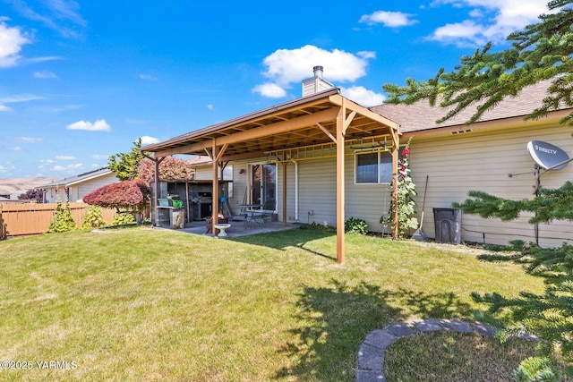 5304 Channel Dr, Yakima, WA 98901 - back of house with a patio and a chimney