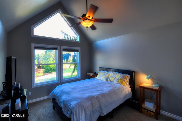 carpeted bedroom featuring lofted ceiling, ceiling fan, and baseboards