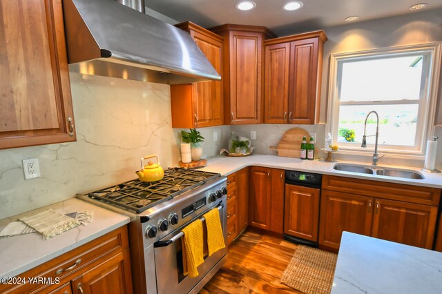 15783 Fisk Rd, Yakima, WA 98908 - kitchen with stainless steel range, extractor fan, a sink, light countertops, and recessed lighting