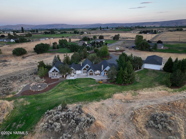 aerial view featuring a rural view and a mountain view