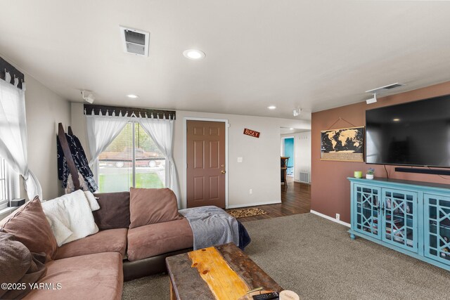 living room with baseboards, recessed lighting, and carpet flooring