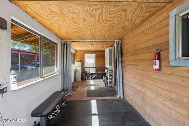 101 W Slavin Rd, Yakima, WA 98903 - hall with wood walls, healthy amount of natural light, and wood ceiling