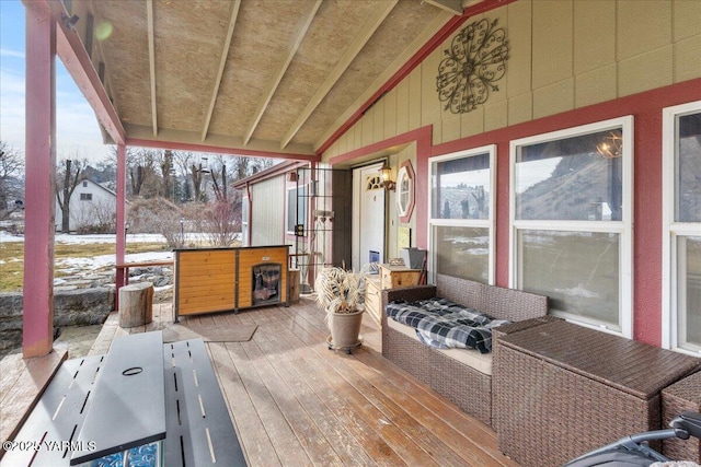 view of snow covered deck