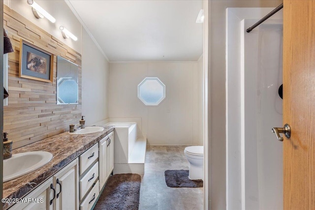 bathroom featuring decorative backsplash, a sink, toilet, and double vanity