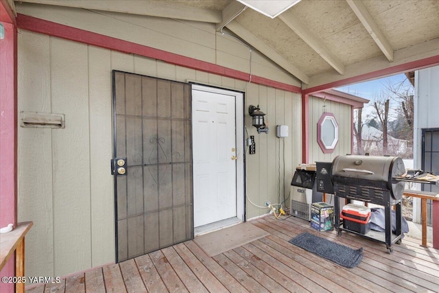 wooden deck with grilling area