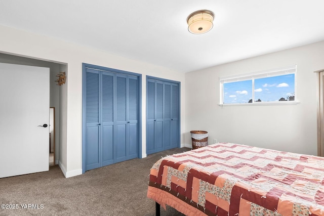 419 N 62nd Ave, Yakima, WA 98908 - carpeted bedroom featuring multiple closets and baseboards