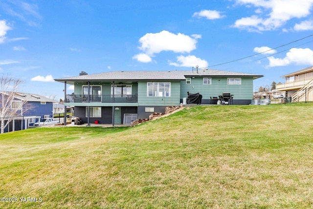 419 N 62nd Ave, Yakima, WA 98908 - rear view of property featuring a yard and a patio area
