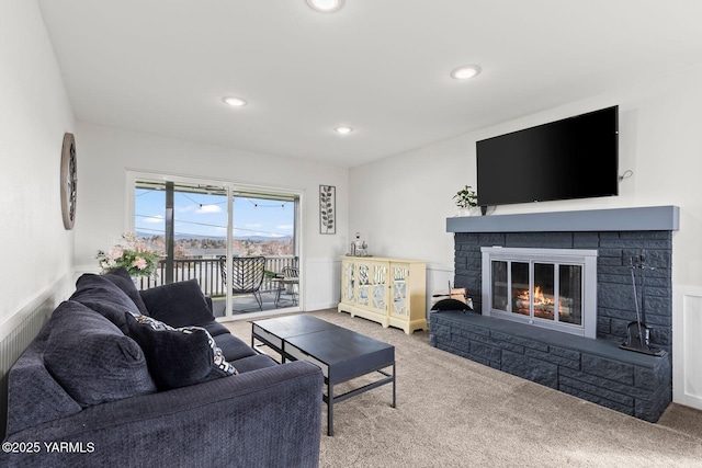 419 N 62nd Ave, Yakima, WA 98908 - living area featuring a fireplace, carpet floors, and recessed lighting