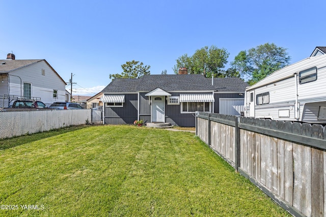 1523 Roosevelt Ave, Yakima, WA 98902 - back of house with entry steps and a chimney