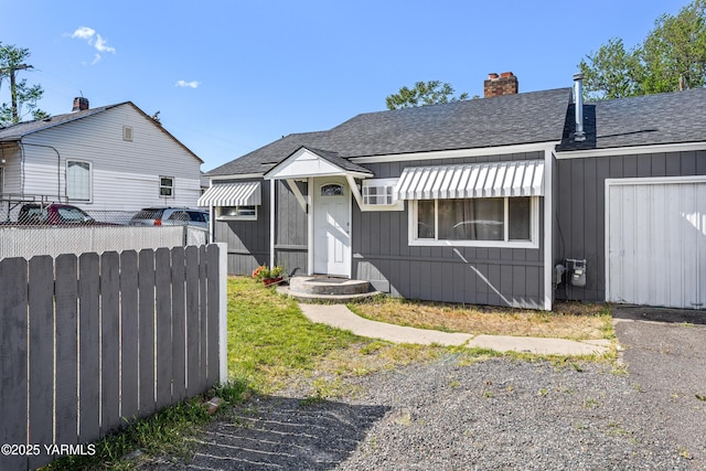 1523 Roosevelt Ave, Yakima, WA 98902 - bungalow-style house with a shingled roof and a chimney