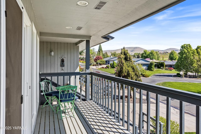 balcony featuring a mountain view