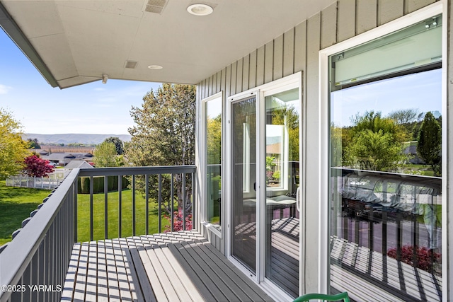 balcony featuring visible vents and a mountain view
