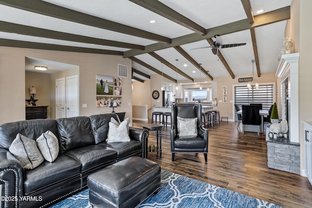 living room with lofted ceiling with beams, a ceiling fan, recessed lighting, dark wood-type flooring, and visible vents