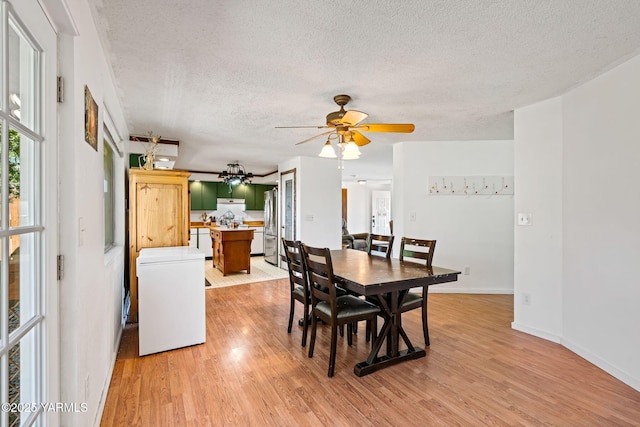 1620 Selah Loop Rd, Selah, WA 98942 - dining space featuring ceiling fan, a textured ceiling, and light wood finished floors