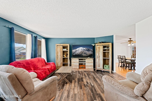 1620 Selah Loop Rd, Selah, WA 98942 - living area with wood finished floors, a textured ceiling, and a ceiling fan