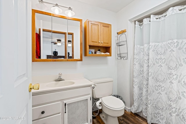 1620 Selah Loop Rd, Selah, WA 98942 - full bath with vanity, wood finished floors, and a shower with shower curtain