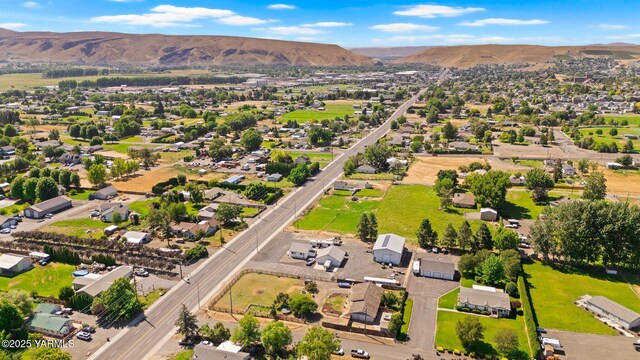 1620 Selah Loop Rd, Selah, WA 98942 - aerial perspective of suburban area featuring a mountainous background