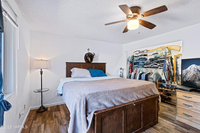 1620 Selah Loop Rd, Selah, WA 98942 - bedroom with dark wood finished floors, a textured ceiling, and ceiling fan