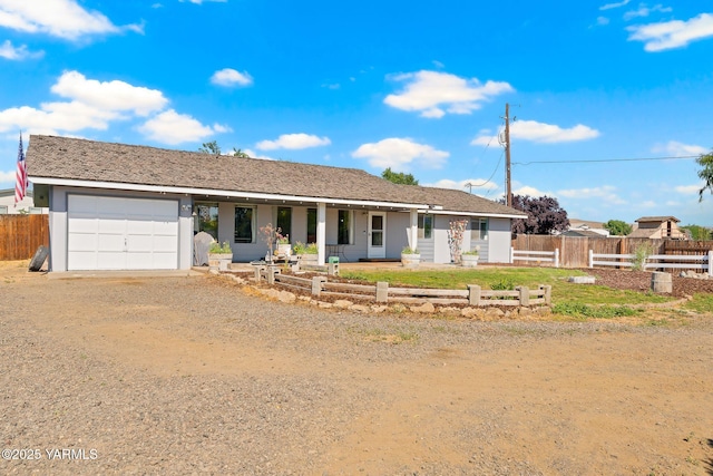 1620 Selah Loop Rd, Selah, WA 98942 - ranch-style home featuring an attached garage, driveway, and covered porch