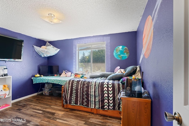 1620 Selah Loop Rd, Selah, WA 98942 - bedroom with a textured ceiling, wood finished floors, and a textured wall