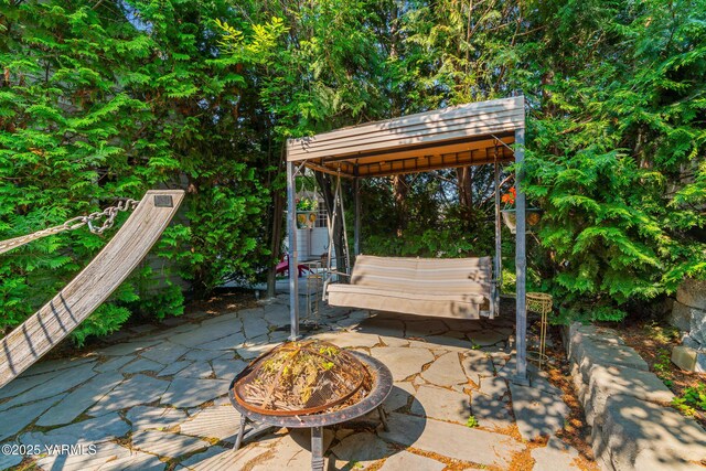 9307 Torrey Pines Ln, Yakima, WA 98908 - view of patio featuring a fire pit