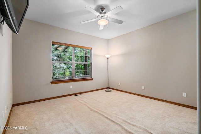 9307 Torrey Pines Ln, Yakima, WA 98908 - carpeted spare room with a ceiling fan and baseboards