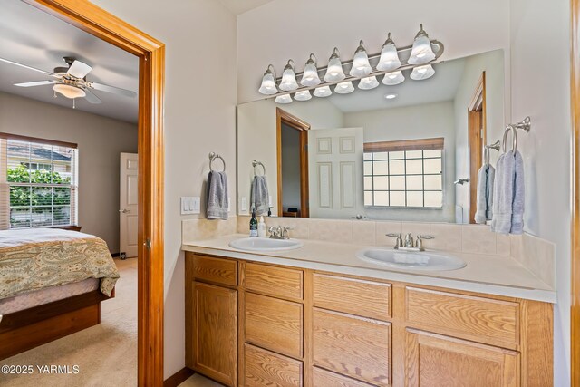 9307 Torrey Pines Ln, Yakima, WA 98908 - ensuite bathroom featuring double vanity and ceiling fan