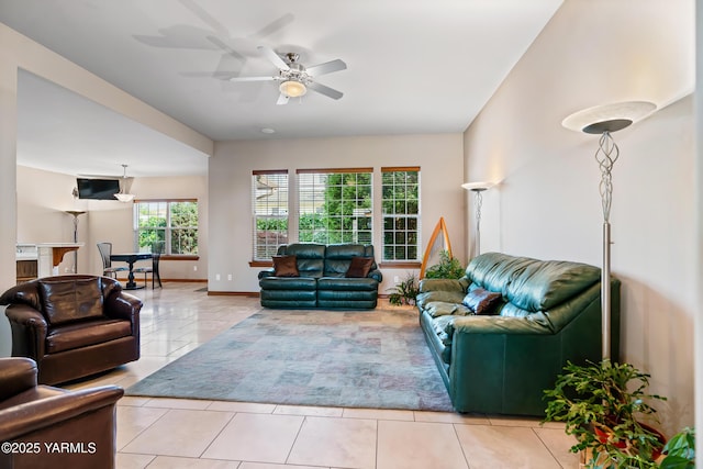 9307 Torrey Pines Ln, Yakima, WA 98908 - tiled living room with ceiling fan and baseboards