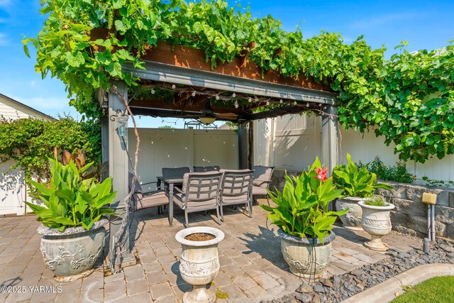 9307 Torrey Pines Ln, Yakima, WA 98908 - view of patio / terrace with outdoor dining space, ceiling fan, and a gazebo