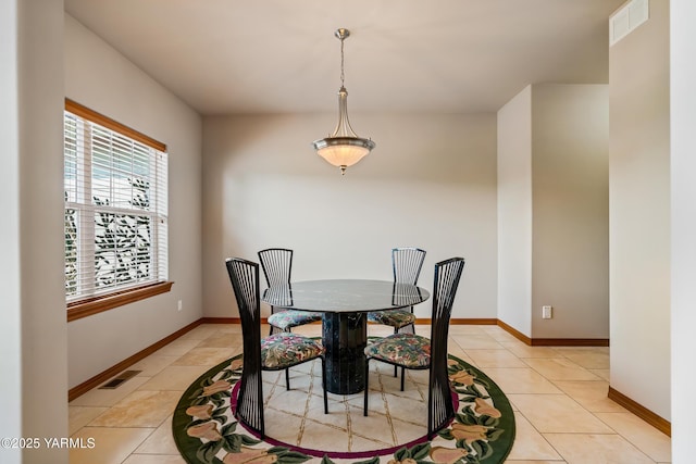 9307 Torrey Pines Ln, Yakima, WA 98908 - dining area featuring baseboards and light tile patterned floors