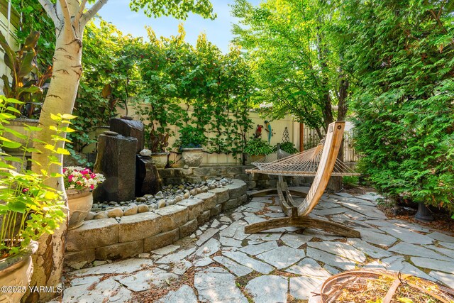 9307 Torrey Pines Ln, Yakima, WA 98908 - fenced backyard featuring a patio area