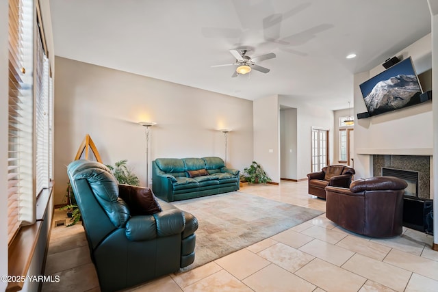 9307 Torrey Pines Ln, Yakima, WA 98908 - living area featuring ceiling fan, light tile patterned floors, a tiled fireplace, and recessed lighting