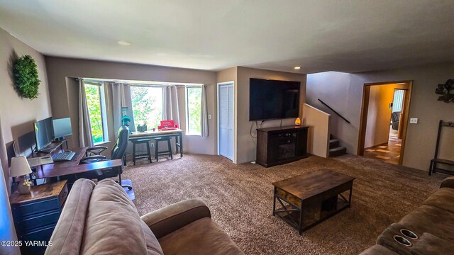 1391 Lancaster Rd, Selah, WA 98942 - carpeted living area with stairway, washer / dryer, recessed lighting, and an office area