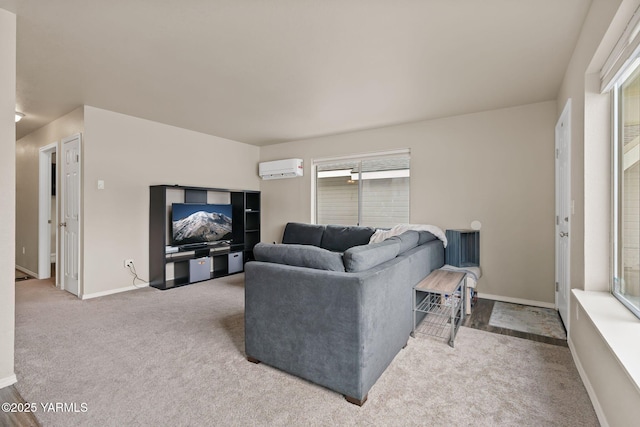 carpeted living room featuring a wall unit AC and baseboards