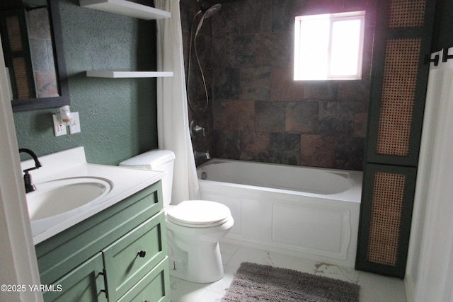 bathroom featuring vanity, shower / bath combo with shower curtain, toilet, a textured wall, and marble finish floor