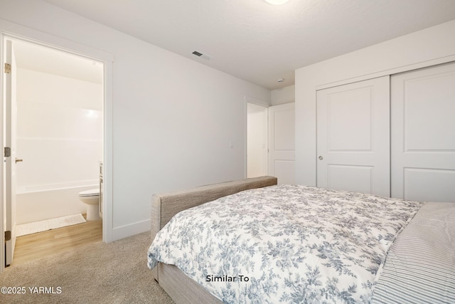 703 Vineyard Street (Phase 2Lot 21) Spec, Grandview, WA 98930 - bedroom featuring a closet, carpet flooring, baseboards, and ensuite bath