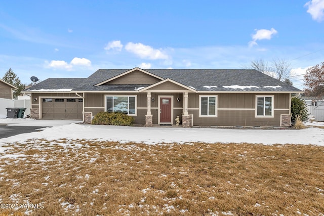 view of front of house featuring driveway, a garage, roof with shingles, crawl space, and board and batten siding