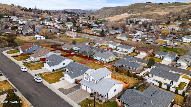 bird's eye view featuring a mountain view and a residential view