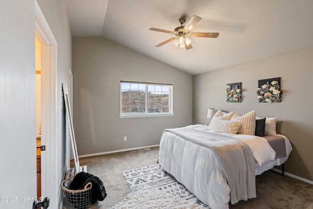 bedroom with ceiling fan, baseboards, carpet, and vaulted ceiling