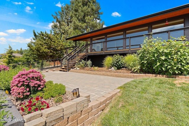 5709 Marilane St, Yakima, WA 98908 - exterior space featuring stairway and a wooden deck