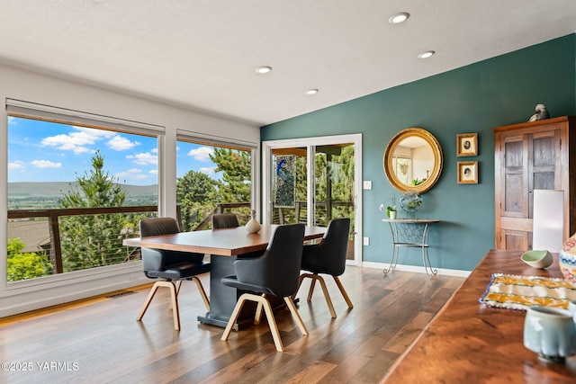 5709 Marilane St, Yakima, WA 98908 - dining area with lofted ceiling, healthy amount of natural light, hardwood / wood-style flooring, and recessed lighting
