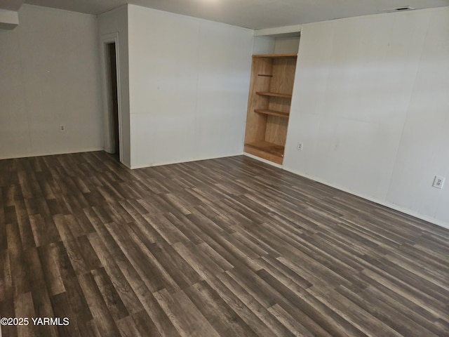 319 NW Crescent Ave, Sunnyside, WA 98944 - unfurnished room with dark wood finished floors