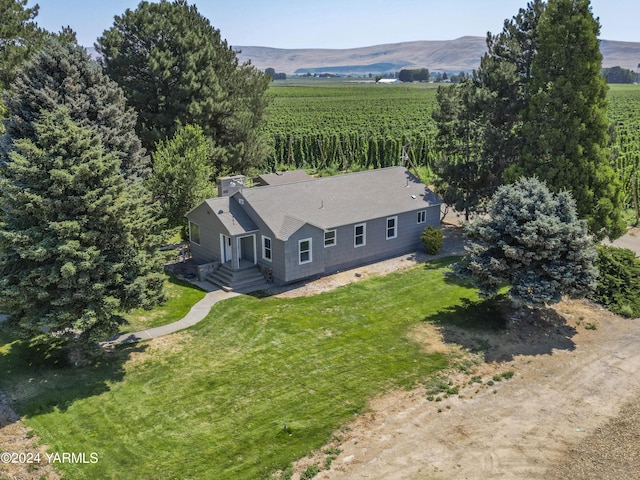 birds eye view of property featuring a rural view and a mountain view