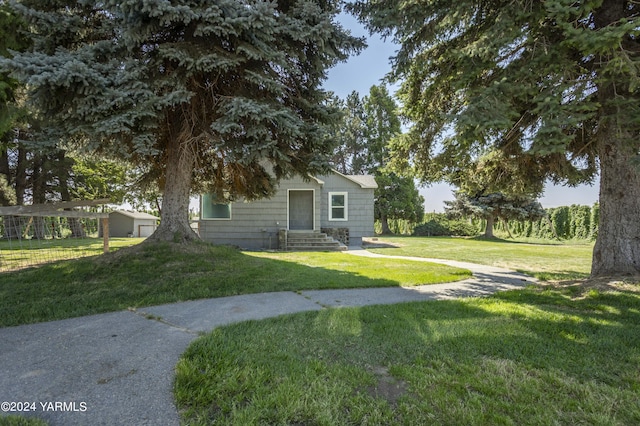 exterior space with a front yard